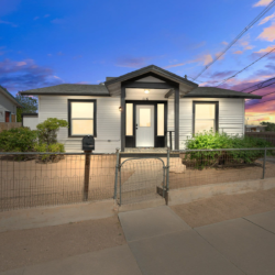 Route 66 Getaway at dusk: the 1935 Craftsman home in Downtown Kingman