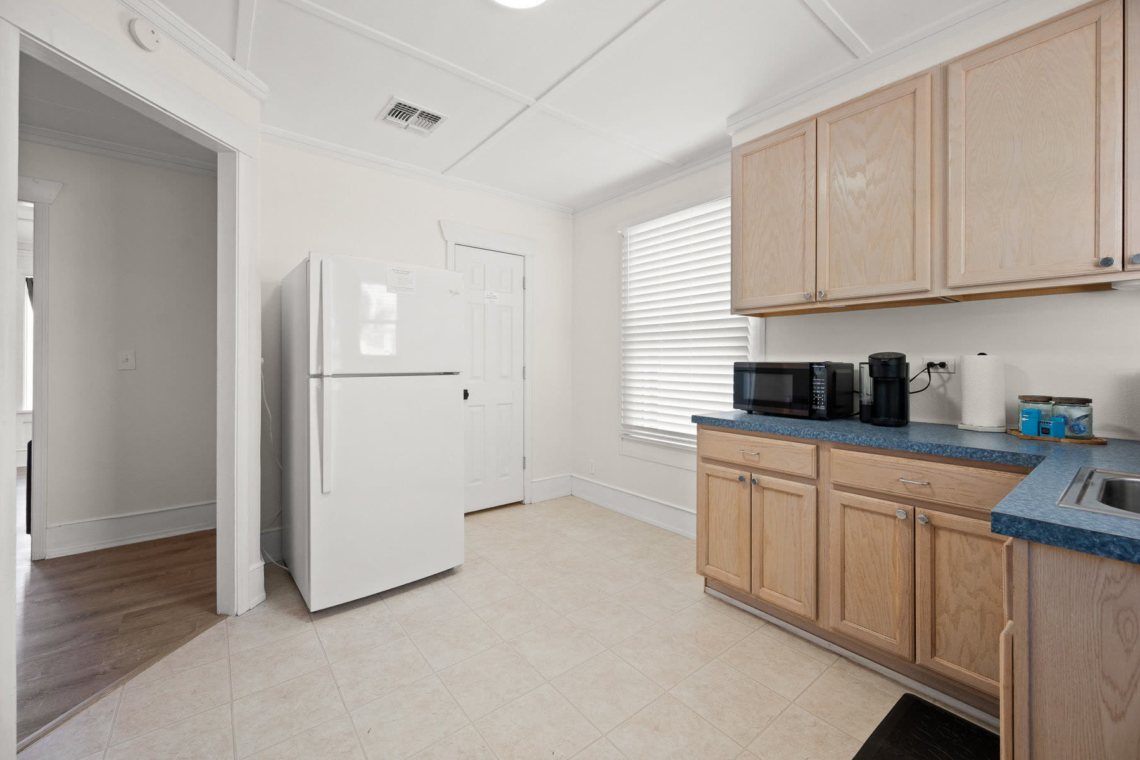 Kitchen with refrigerator
