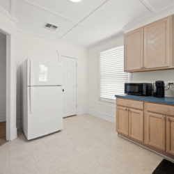Kitchen with refrigerator