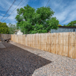 Fenced yard on the side of the house